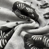 Vente en gros de molleton de corail de conception d'impression de dessin animé en polyester doux et confortable pour les textiles d'intérieur
