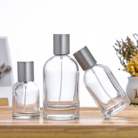 30ml 50ml 100ml Vente en gros Conception de bouteille de parfum en verre avec couvercles Bouteille de parfum de luxe 50ml
