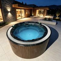 Baignoires de spa rondes en acrylique noir pour l'extérieur, bain à remous extérieur, spa avec massage