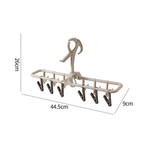 Colgadores de plástico plegables con 12 clips para bufandas de bebé, ropa corta, calcetines, ropa interior y toallas; y estante de plástico con ocho clips para medias. - Product Image 2