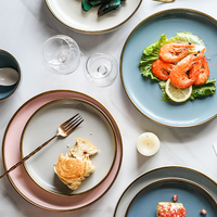 Ensemble d'assiettes à dessert rondes en céramique porcelaine or blanc de haute qualité pour mariage personnalisé avec rebord doré pour restaurant