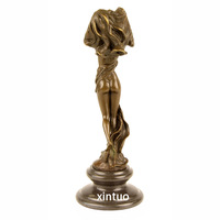 Sculpture en bronze fabriquée à la main représentant une danseuse nue: une œuvre d'art pour les amateurs d'art du monde entier