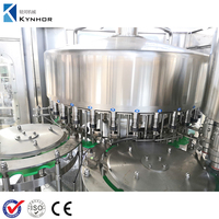 Machine de remplissage d'eau pure approuvée à Dubaï | Ligne d'embouteillage automatique avec fonctions de bouchage/étiquetage pour bouteilles de 500ml à 2 litres