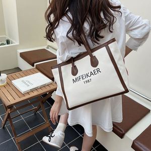 กระเป๋าโท้ทสำหรับเดินทาง ช้อปปิ้ง ทำธุรกิจ  ขนาดใหญ่ ใส่ของได้เยอะ  พร้อมโลโก้สั่งทำพิเศษ สำหรับผู้หญิง - Product Image 1