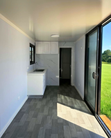 Maison miniature moderne sur roues avec 8 lumières LED |   Maison mobile à montage rapide pour la vie hors réseau |   Cabine montée sur remorque