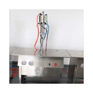 Machine automatique de remplissage et de scellage d'aérosols pour gaz liquide (butane, propane) et parfums en spray - Product Image 4