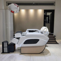 Fauteuil de massage multifonctionnel moderne en cuir PU pour salon de coiffure et spa, avec bac en céramique et repose-pieds réglable pour salle de bain