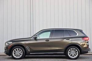 รถยนต์อเนกประสงค์ AWD XDrive45e 4 ประตู สปอร์ต แอคทิวิตี้ วีฮิเคิล รถใหม่และรถมือสอง พวงมาลัยซ้าย ภายในสีเข้ม เครื่องยนต์ เบาะหนัง ยาง R19 - Product Image 3