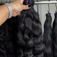 Cierre de paquete de cinta rizada de pelo camboyano dibujado doble al por mayor fábrica de exportaciones de cabello vietnamita crudo sin procesar de un donante