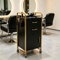 Chariot de rangement de salon de luxe en métal doré et noir, chariot de coiffure et de beauté avec tiroir et armoire