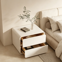 Table de chevet minimaliste moderne avec glissières silencieuses, coins arrondis et design compact pour le rangement de la chambre à coucher