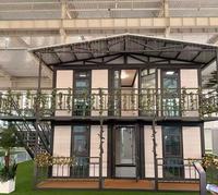 Casa de contenedores de acero y madera de dos pisos, piso desmontable con baño y cocina para hoteles y apartamentos