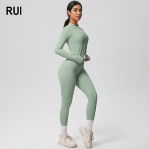 ชุดโยคะผู้หญิงขายดี RUIQUWIN สีพื้น ระบายอากาศได้ดี ไร้รอยต่อ ซับเหงื่อ ยืดได้สี่ทิศทาง เอวยางยืด ชุดออกกำลังกาย - Product Image 1