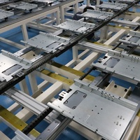 Convoyeur automatique multi-stations à rail circulaire large Qingong pour la circulation parallèle des composants lourds dans l'assemblage de moteurs