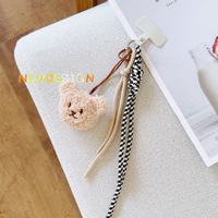 Lanière tendance en peluche en forme d'ours, chaîne de téléphone portable courte, pendentif à la mode, charme pour étuis d'iPhone, décoration de sac à dos, jouet en peluche mignon