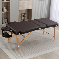 Table de massage pliable portable, directement de l'usine, avec structure en bois, design moderne et léger, pour spa, salon, maison et séjour.