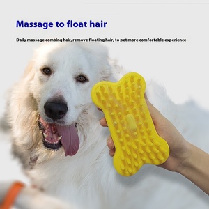 2025 nuevo diseño cepillo de baño de limpieza de mascotas en forma de hueso cepillo de masaje de depilación flotante de plástico para perros y gatos para uso transfronterizo - Product Image 3