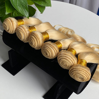 Fournisseur en gros de cheveux humains vierges bruts 100% naturels, blond 613, en vrac, ondulés