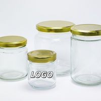Vente en gros de pots en verre transparent ronds écologiques avec couvercles en métal pour le stockage du miel, des confitures, de l'huile d'olive et du sucre