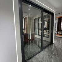 Porte coulissante moderne à grande ouverture avec double vitrage, isolation thermique et insonorisation pour balcon et villa