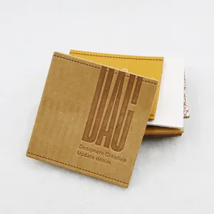 High quality custom laser cut garment leather tags hot stamped make hat pu leather tag leather labels for clothing