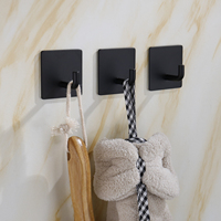 Crochet mural multifonctionnel en acier inoxydable noir/argent pour salle de bain, design goutte d'eau, crochets en métal perforé
