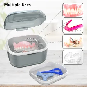 กล่องทำความสะอาดฟันปลอมพลาสติกพร้อมตาข่ายกรองสำหรับทำความสะอาดและจัดเก็บ