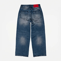 Jean en denim à ourlet effiloché pour homme, coupe large et décontractée, tombé ample, poches usées, bleu vintage, effet moustaches, style streetwear personnalisé