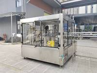 Machine de remplissage et de bouchage automatique de sachets souples à haute viscosité pour pâtes, sauces, miel, boissons et eau