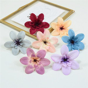 Flores de orquídea de seda artificial Dongchen Crafts para accesorios para el cabello y decoración del hogar - Product Image 1