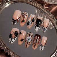 24/30 pièces Faux ongles à presser en ABS, forme amande, motif fantôme flottant 3D mignon d'Halloween, avec motif lune dorée exquis, pré-conçus pour les doigts