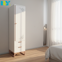 Armoire en acier moderne avec deux tiroirs, idéale pour les chambres ou les appartements, dotée de portes ventilées.