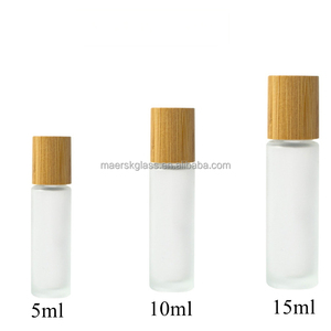 5ml10ml thép Lăn nước hoa tinh dầu <span class=keywords><strong>m</strong></span>ờ <span class=keywords><strong>m</strong></span>ờ thủy tinh <span class=keywords><strong>m</strong></span>àu đen cuộn trên chai với hạt gỗ nắp nhựa - Product Image 6