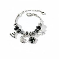 Bracelet Fanhua Jewelry, best-seller TikTok, en acier inoxydable plaqué or, imperméable, avec motif chapeau de sorcier, lune, Saturne et étoile.