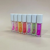 Huile à lèvres repulpante hydratante en profondeur, scintillante, au goût fruité, en pot blanc, cosmétique à marque privée
