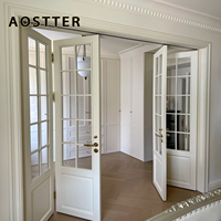 Porte pliante en aluminium AOSTTER de style grille avec panneau de sécurité transparent et amortisseur à fermeture douce pour architecture classique