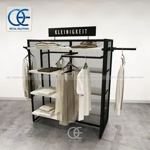 Étagère design pour magasin de détail Étagères à vêtements pour présentoir à vêtements Comptoir pour magasin de vêtements Fournitures ménagères