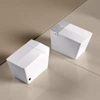 Cuvettes de toilette intelligentes montées au sol pour hôtels modernes Ensemble de toilettes électroniques en céramique automatique et intelligente pour salle de bains