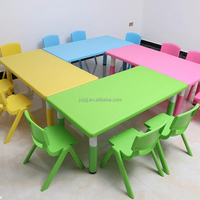 Juego de Mesa y Sillas Infantiles de Plástico Ecológico Moderno con Respaldo para Uso en Jardín de Niños y Escuela