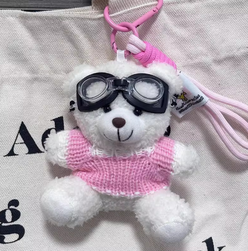 Oso blanco 1/cordón en polvo con gafas