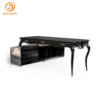 Bureau moderne de luxe noir avec tiroirs sculptés, poignées argentées, pieds courbés et armoire mobile – Table d'écriture haut de gamme pour bureau à domicile