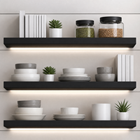 Système d'armoires de cuisine modernes sur mesure, sans poignées, en panneaux de mélamine vert sauge, porte en verre, étagère flottante LED, rangement en acier inoxydable