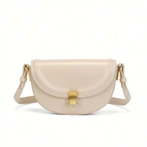 Bolso de mujer de moda francesa de nicho italiano bolso de sillín redondo cien veces hebilla de concha PUFlat crema blanco Mini bolso de hombro con textura - Product Image 6