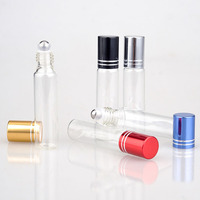 Flacon de parfum miniature rond en verre transparent de 10 ml, pas cher, personnalisé, pour huile essentielle, gloss à lèvres, avec bille roulante et bouchon métallique