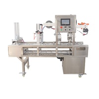 Machine automatique de cachetage de tasse de yaourt et de jus de petite taille Machine de conditionnement multifonctionnelle de tasse en plastique pour des usines
