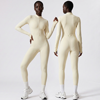 Nouvelle combinaison moulante à manches longues et fermeture éclair pour femme, idéale pour le fitness, la course, l'entraînement sportif et le yoga, noire et sans coutures.