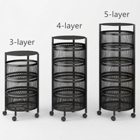 Chariot de rangement rotatif multi-niveaux en métal grillagé sur roulettes pour fruits, légumes, pots et courses