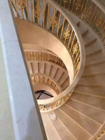 Villa intérieur design moderne escalier en colimaçon beige marbre escalier courbe projet