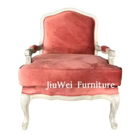Fauteuil simple de style vintage, cadre en bois clair, coussin en tissu bleu, fauteuil de salon, durable