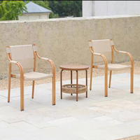Ensemble de salle à manger d'extérieur rond, table en aluminium à motif soleil avec chaises Breeze, mobilier d'extérieur design pour villa, patio et jardin